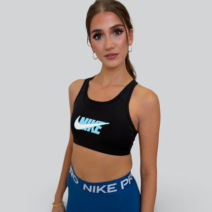 Front view of Nike women’s sports bra with Swoosh logo design