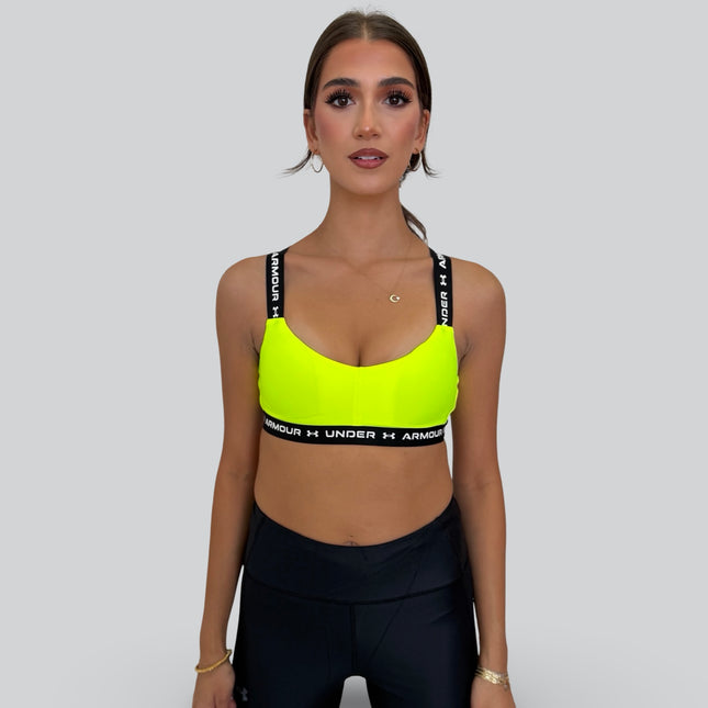 Under Armour women’s crossback low-support sports bra in high-vis yellow with black elastic band