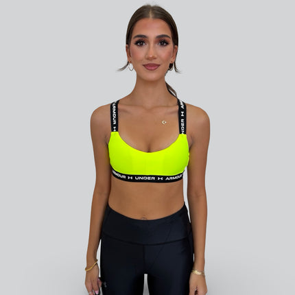 Under Armour women’s crossback low-support sports bra in high-vis yellow with black elastic band