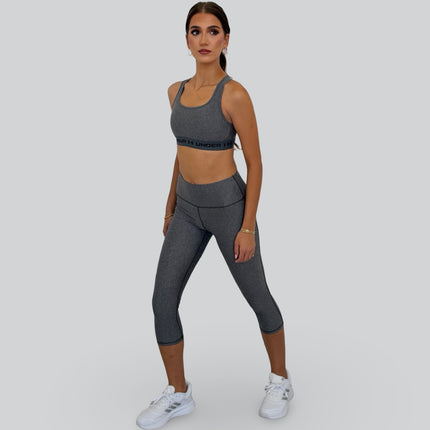 Under Armour women’s charcoal heather sports bra with second-skin fit