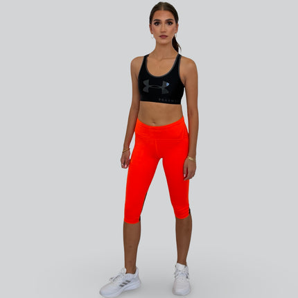 Under Armour women’s mid-support keyhole sports bra in black and jet grey