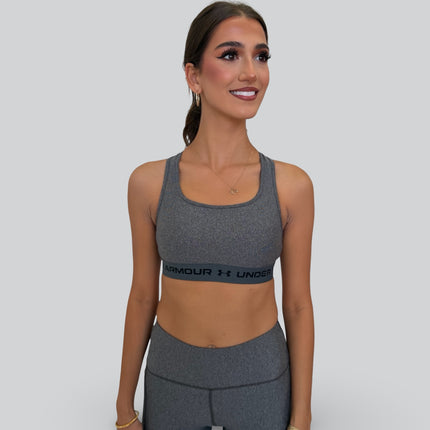 Under Armour women’s crossback mid-support sports bra in charcoal and grey