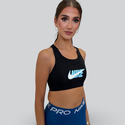 Nike women’s Dri-FIT Swoosh Icon Clash sports bra in black and blue