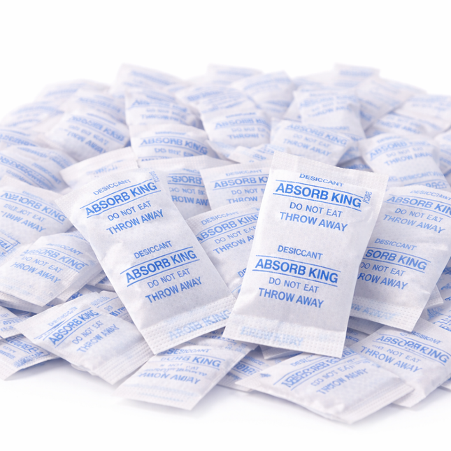 Silica gel packets 1g moisture absorber desiccant bulk on white background