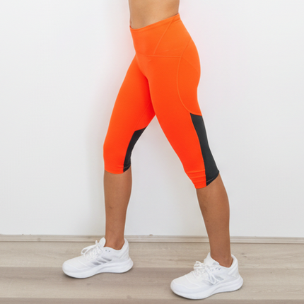 Under Armour Women's UA FLY-FAST Mid Rise Speed Capri Tights - Phoenix Fire/Jet Grey/Reflective